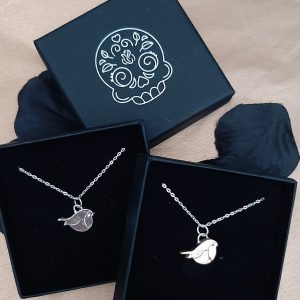 robin necklaces in jewellery boxes