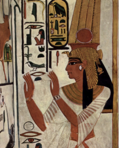 Egyptian wall painting of a woman with hieroglyphs surrounding her
