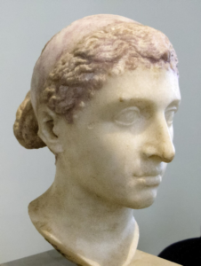 Pale stone bust of female