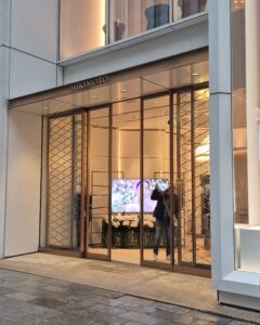 a minimal jewellery shop front in a shopping street in Japan