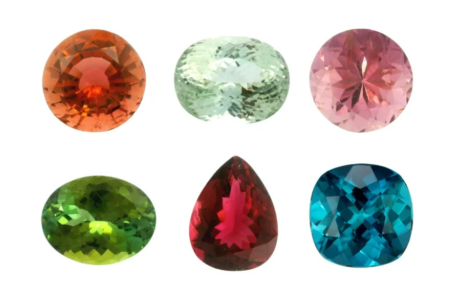 6 different coloured gemstones on a white background
