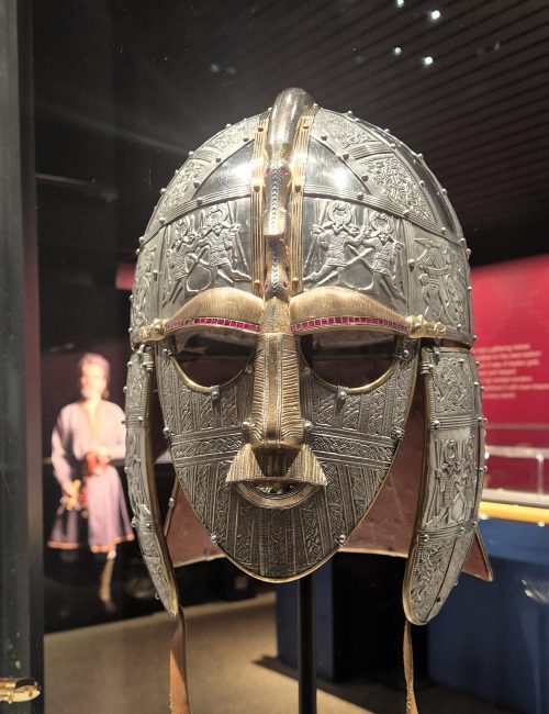 Replica Sutton Hoo helmet in a display case at Sutton Hoo National Trust